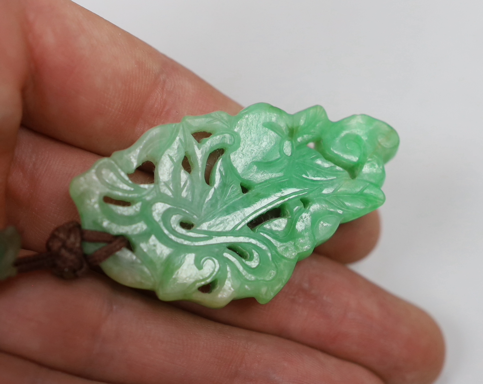 Two jadeite carvings, fish and fruit